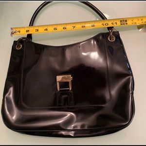 Gucci patten leather purse.